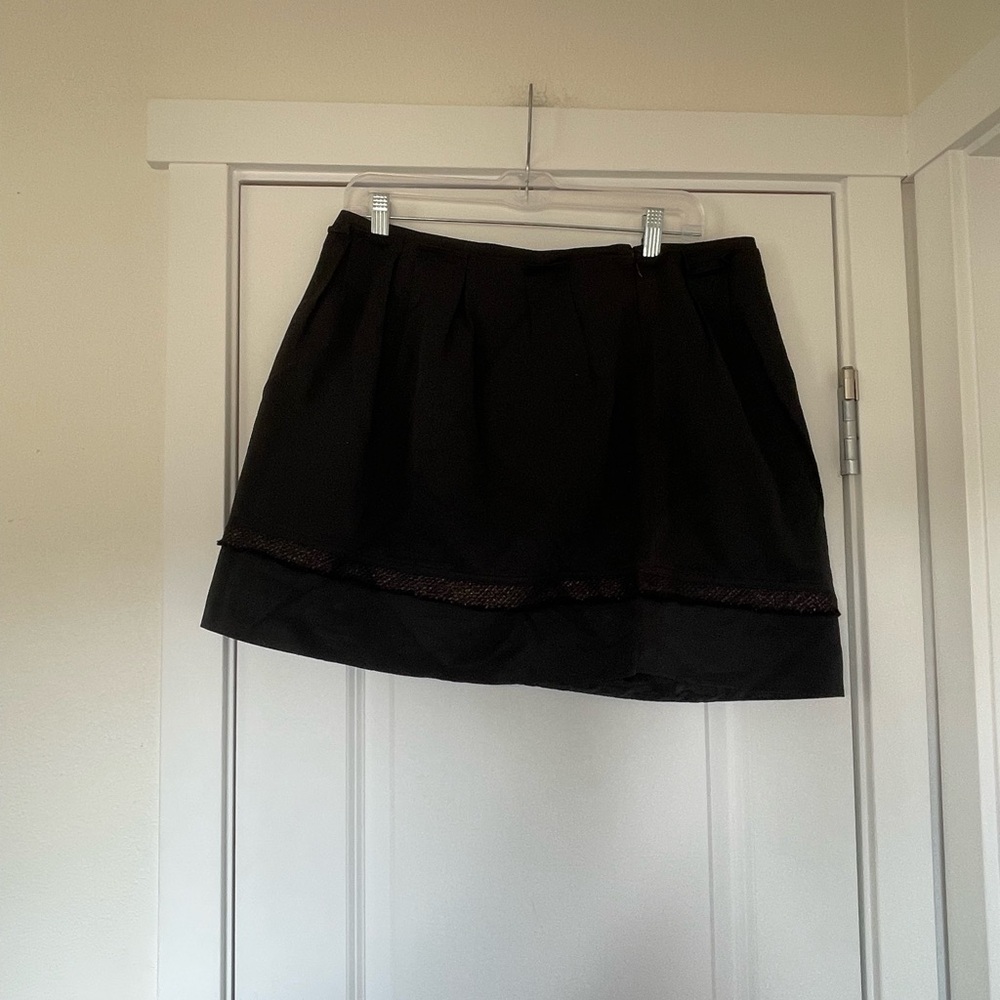 Black above the knee skirt with wool plaid lined design